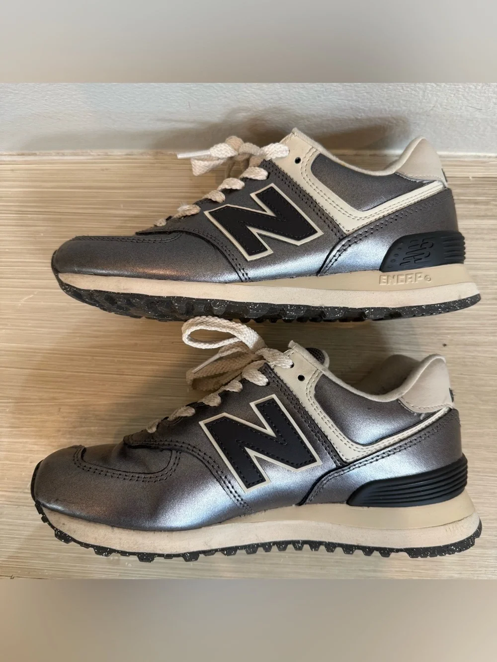 New Balance women’s Metallic Gray and Cream Low-Top Sneakers size 7